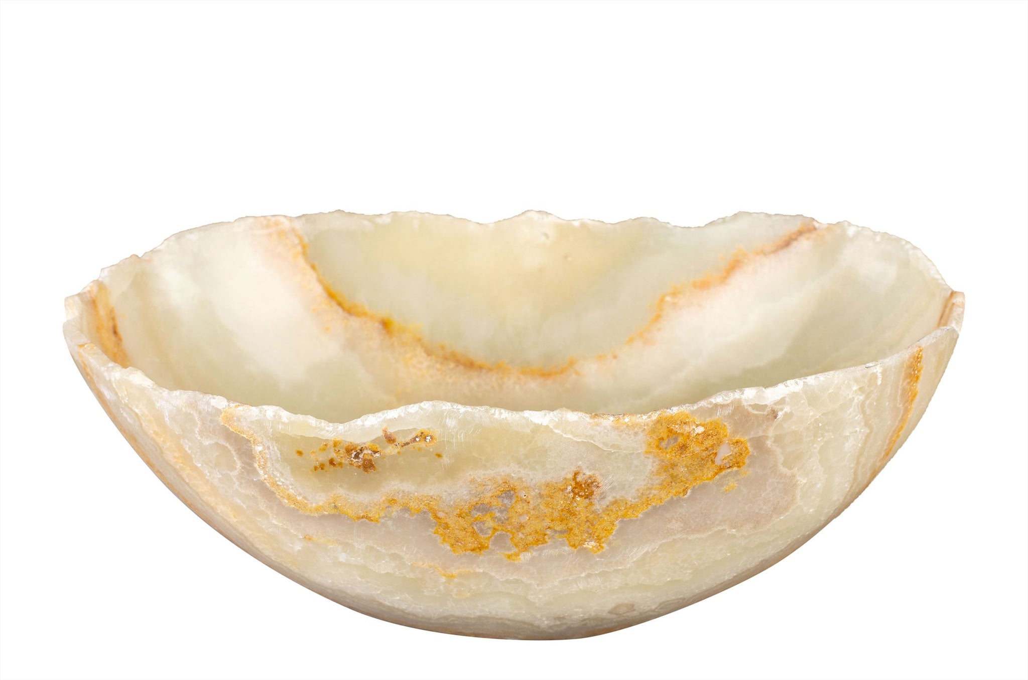 Decoratieve schaal van dun gesneden onyx in zachte, gelaagde tinten.