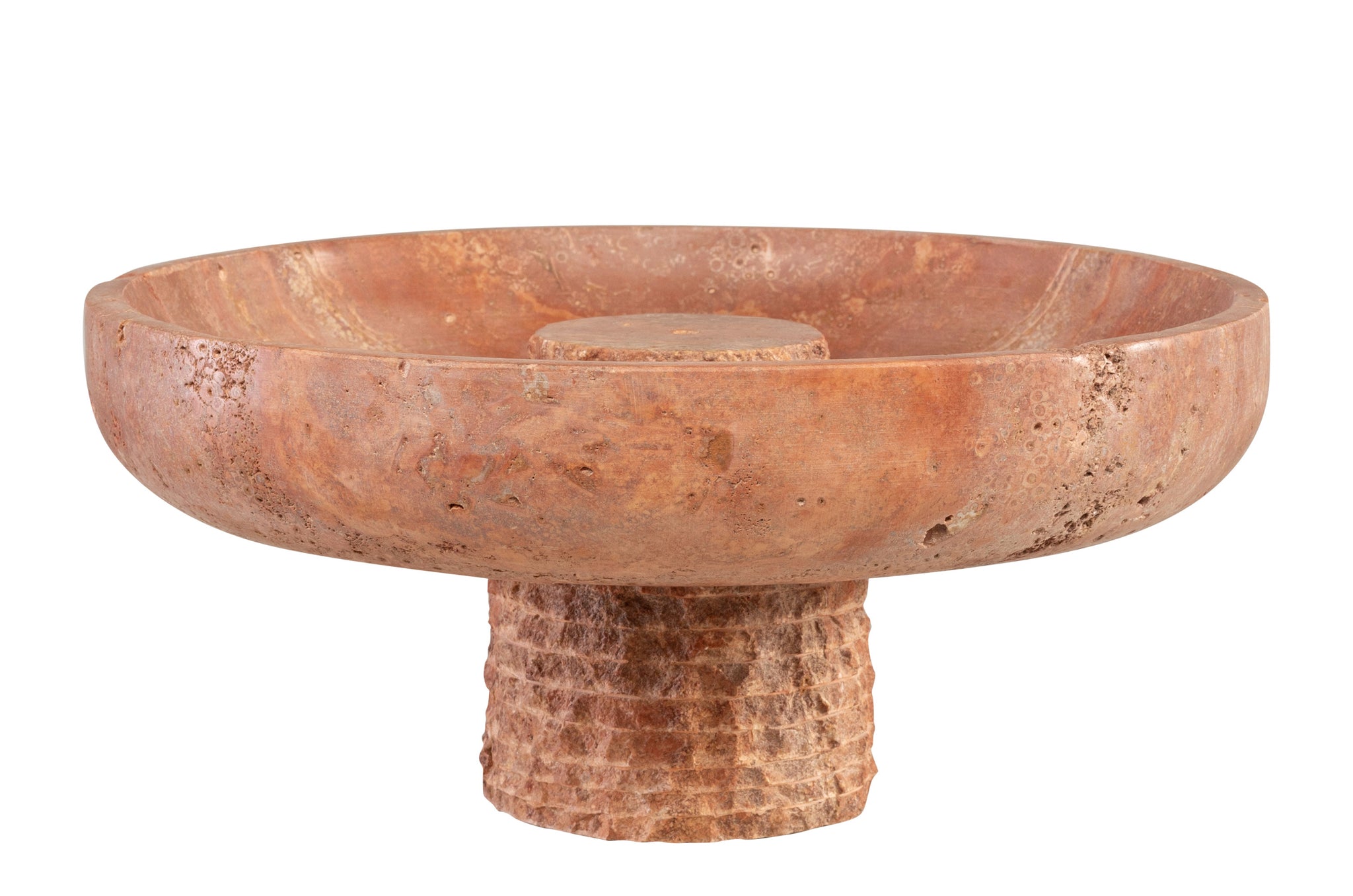 Luxe stenen schaal in warm rood travertijn met sculpturale uitstraling.