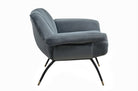 Comfortabele fauteuil Abbey in slate velvet met slanke poten