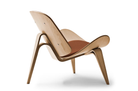 Iconische Shell Chair met drie poten en zwevend ontwerp