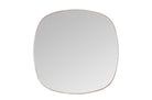 Organisch gevormde wandspiegel met slank messing frame in brushed gold.