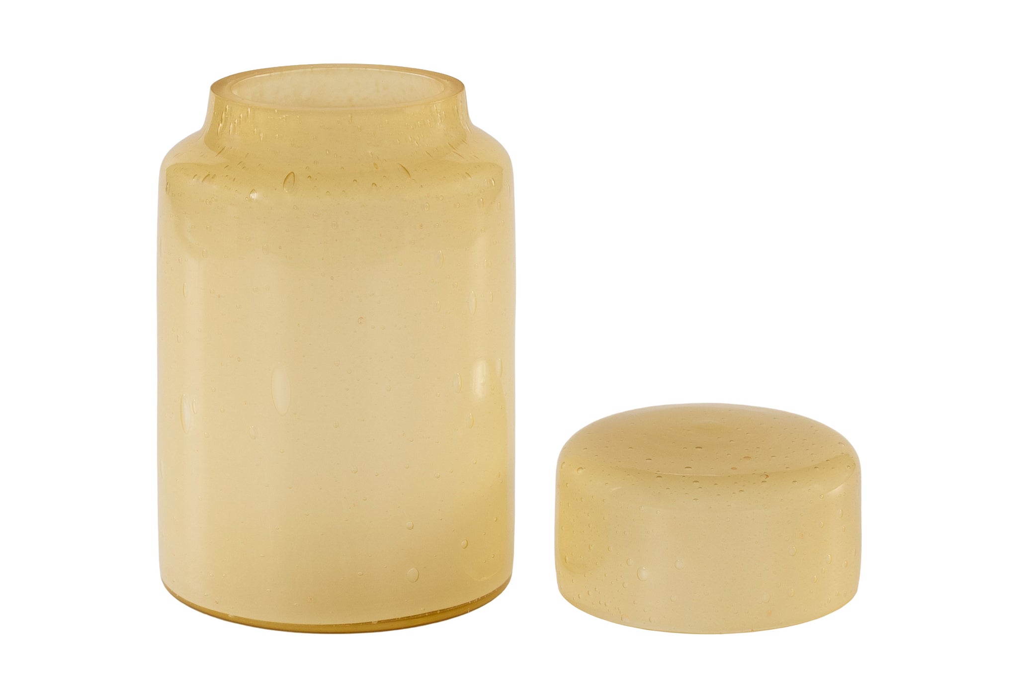 Okerkleurige glass jar met natuurlijke luchtbelletjes in het glas