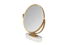 Elegante goudkleurige make-up spiegel op marmeren basis.