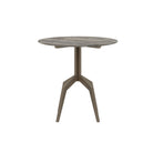 Ronde design eettafel van Versmissen met blad van travertijn en modern metalen frame