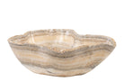 Onyx schaal met natuurlijke lagen in beige, crème en grijs.